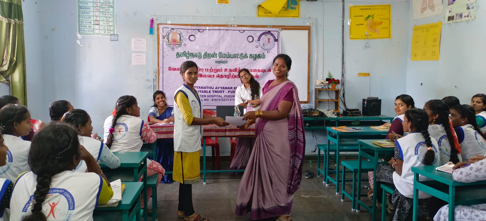 Student receiving recognition during a trust program